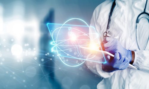 Doctor in containment suit using a tablet pen technology with 3d hologram display, female anatomy diagnosis analysis , medical healthcare specialist worker banner copyspace hospital background